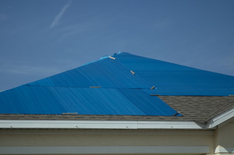 Tarp Installation During Storm